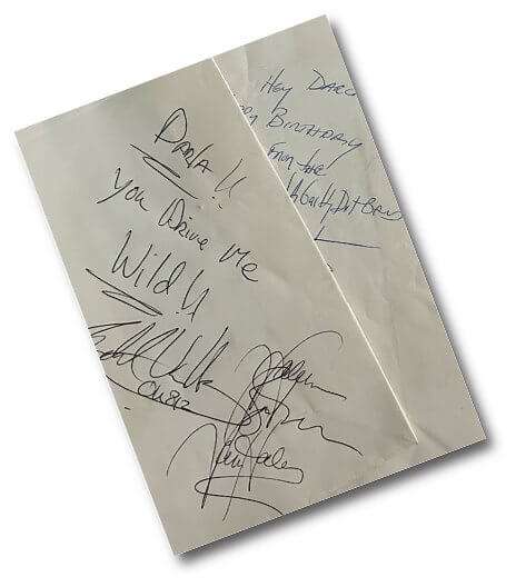 Autographs on Aspen Airlines air-sickness bags